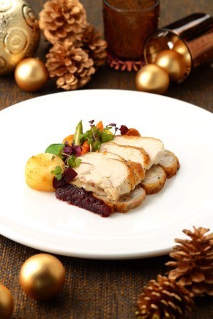 Roasted turkey breast and leg roulade with Brie cheese chestnut croquette and apple goose foie gras sauce